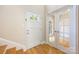 Bright foyer featuring hardwood floors and decorative white doors leading to other rooms at 4790 Cascade Ave, Rock Hill, SC 29732