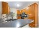 Functional kitchen with stainless steel sink, stone countertop, and stylish fixtures, designed for efficiency and style at 4790 Cascade Ave, Rock Hill, SC 29732