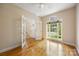Bright office space featuring a large window, french doors and hardwood floors at 4790 Cascade Ave, Rock Hill, SC 29732