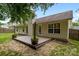 An exterior view of a home with green grass features a wood deck and privacy fence at 508 Long Creek Pkwy, Charlotte, NC 28214