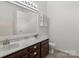 Bathroom features a double sink vanity, framed mirror and medicine cabinet at 508 Long Creek Pkwy, Charlotte, NC 28214