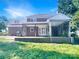 Expansive backyard with covered patio and well-maintained lawn at 628 Highland Ridge Rd, Mooresville, NC 28115
