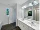 Well-lit bathroom features double sinks, tub, and sleek fixtures at 628 Highland Ridge Rd, Mooresville, NC 28115