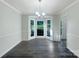 Bright dining room features a large bay window, dark hardwood floors, modern lighting, and fresh neutral paint at 628 Highland Ridge Rd, Mooresville, NC 28115