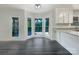 Bright dining area with large bay windows and backyard access at 628 Highland Ridge Rd, Mooresville, NC 28115