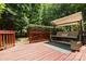 Relax on this backyard swing with a view of the landscaped yard at 6729 Garden Hill Dr, Huntersville, NC 28078