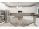 Modern kitchen featuring granite countertops and stainless steel appliances at 6729 Garden Hill Dr, Huntersville, NC 28078