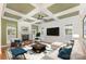 Inviting living room with fireplace, large-screen TV, and plush seating, perfect for relaxation and entertainment at 6729 Garden Hill Dr, Huntersville, NC 28078