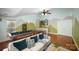 Bright recreation room with a pool table, comfortable seating, and mountain-themed decor at 6729 Garden Hill Dr, Huntersville, NC 28078