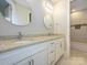 Stylish bathroom with dual sinks, granite counters, and modern fixtures at 7324 Leharne Dr, Charlotte, NC 28270