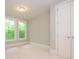 Well lit bedroom featuring plush carpeting, recessed lights and neutral walls at 7324 Leharne Dr, Charlotte, NC 28270