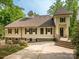 Charming home featuring light siding, dark shutters, and inviting curb appeal at 7324 Leharne Dr, Charlotte, NC 28270