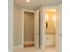 Hallway leading to walk-in closet and bathroom at 7324 Leharne Dr, Charlotte, NC 28270