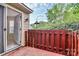 Cozy back patio with brick pavers, privacy fence, and open doorway at 9232 Four Mile Creek Rd, Charlotte, NC 28277