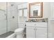 Updated bathroom with glass shower, marble countertop, and modern fixtures at 9232 Four Mile Creek Rd, Charlotte, NC 28277