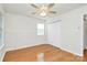 Comfortable bedroom with hardwood floors, closet, and natural light at 9232 Four Mile Creek Rd, Charlotte, NC 28277