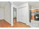 Hallway connecting the living area to the kitchen at 9232 Four Mile Creek Rd, Charlotte, NC 28277