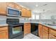 Well-equipped kitchen with granite countertops, ample cabinet space, and modern appliances at 9232 Four Mile Creek Rd, Charlotte, NC 28277