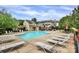 Community swimming pool with lounge chairs and well-maintained landscaping at 9232 Four Mile Creek Rd, Charlotte, NC 28277