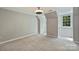 Neutral bedroom with carpeting, and natural light from the windows at 9526 Greyson Ridge Dr, Charlotte, NC 28277
