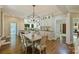 Stylish dining room with modern lighting and an open-concept layout at 9526 Greyson Ridge Dr, Charlotte, NC 28277