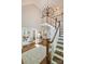 Elegant foyer with a staircase, hardwood floors, area rug, and views of other rooms in the house at 9526 Greyson Ridge Dr, Charlotte, NC 28277