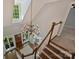 Foyer with hardwood staircase, chandelier, and large windows that let in natural light at 9526 Greyson Ridge Dr, Charlotte, NC 28277