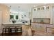 Gourmet kitchen with stainless steel appliances and an island with bar seating at 9526 Greyson Ridge Dr, Charlotte, NC 28277