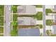 Aerial view of the homes showcasing their roofs, driveways, and well-manicured lawns at 1004 Craven St, Indian Trail, NC 28079