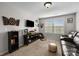 A bedroom featuring an oversized leather couch and natural light through the window at 1004 Craven St, Indian Trail, NC 28079