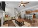 Open-concept living area showcases hardwood floors and seamless transitions to the kitchen and staircase at 1004 Craven St, Indian Trail, NC 28079