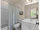 Traditional bathroom with a combination tub/shower and a well-lit vanity area at 1009 Seminole Dr, Waxhaw, NC 28173
