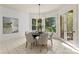 Breakfast nook with bay window, table, and seating, perfect for casual dining at 1009 Seminole Dr, Waxhaw, NC 28173