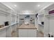 Spacious walk-in closet with custom shelving and ample storage, perfect for organization at 1009 Seminole Dr, Waxhaw, NC 28173