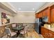 Cozy dining area with space for four and a convenient wet bar or snack area at 1009 Seminole Dr, Waxhaw, NC 28173