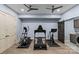 A home gym equipped with an elliptical, treadmill, and exercise bike at 1009 Seminole Dr, Waxhaw, NC 28173