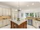 Well-appointed kitchen with granite countertops, stainless steel appliances, and ample cabinet space at 1009 Seminole Dr, Waxhaw, NC 28173