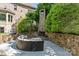 Outdoor fireplace featuring stone accents at 1009 Seminole Dr, Waxhaw, NC 28173