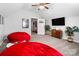Large bonus room with vaulted ceiling, beanbag chairs, and media setup for relaxation at 10115 Paxton Run Rd, Charlotte, NC 28277