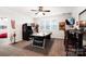 Spacious game room features an air hockey table, arcade games, and a bar area for entertaining at 10115 Paxton Run Rd, Charlotte, NC 28277
