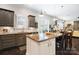 Kitchen with granite countertops, stainless steel appliances, and pendant lighting at 10115 Paxton Run Rd, Charlotte, NC 28277