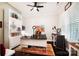 Bright office featuring built-in shelving, modern lighting, and ample workspace at 10115 Paxton Run Rd, Charlotte, NC 28277