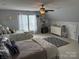 Large bedroom with two beds, carpet floor, ceiling fan, and lots of storage at 12244 Wallace Ridge Dr, Charlotte, NC 28269