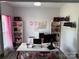 Home office with lots of storage space, great natural light, and modern decor at 12244 Wallace Ridge Dr, Charlotte, NC 28269