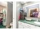 Functional bathroom featuring a tiled shower and an organized vanity space with storage at 124 10Th Sw St, Conover, NC 28613