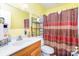 Full bathroom with single vanity and shower with curtain at 124 10Th Sw St, Conover, NC 28613