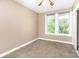 Bedroom with neutral carpet, double windows and a closet at 124 10Th Sw St, Conover, NC 28613