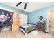 Bedroom with natural light, ceiling fan, and colorful decor at 124 10Th Sw St, Conover, NC 28613