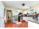 Well-lit kitchen boasts stainless steel appliances, white cabinetry, and copper backsplash at 124 10Th Sw St, Conover, NC 28613