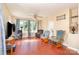 Bright living room boasts hardwood floors, natural light, and cozy rocking chairs, perfect for relaxing at 124 10Th Sw St, Conover, NC 28613